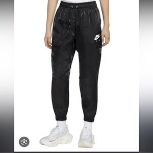 Nike women’s shiny black air sheen joggers size XS